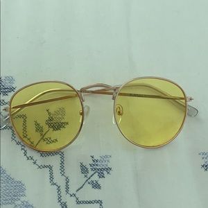 Yellow lens round sunglasses